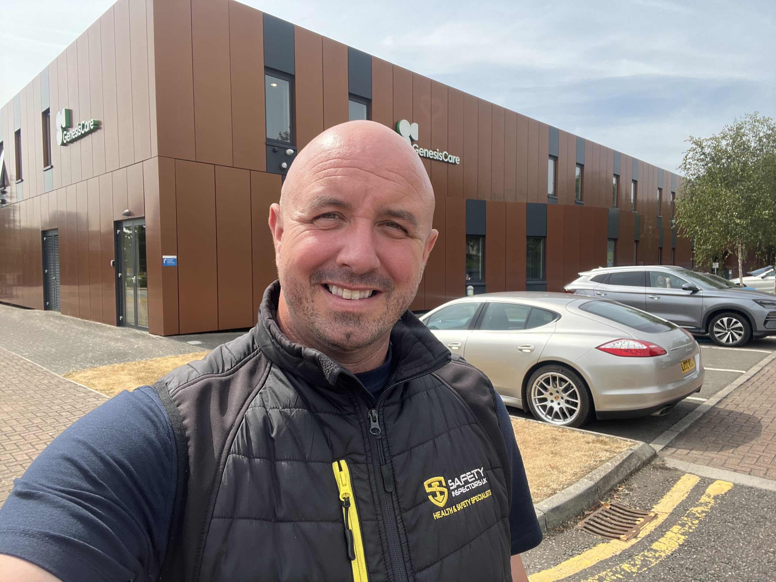 Supporting GenesisCare with Fire Evacuation Plans and Asset Mapping Safety Inspectors UK consultant outside a GenesisCare healthcare centre while supporting fire evacuation plans, floorplans and fire safety asset mapping